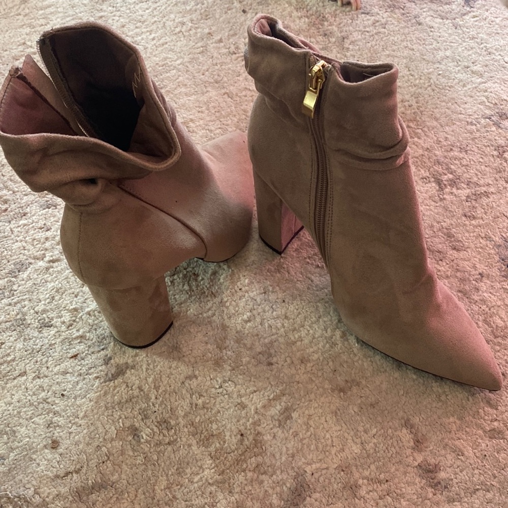 Barely worn cute booties! Cleaning out my closet for the new year. Priced to go!